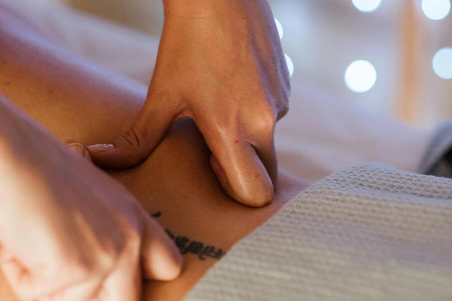 Massage oil applied during a relaxing spa treatment at Hotel Floralpina