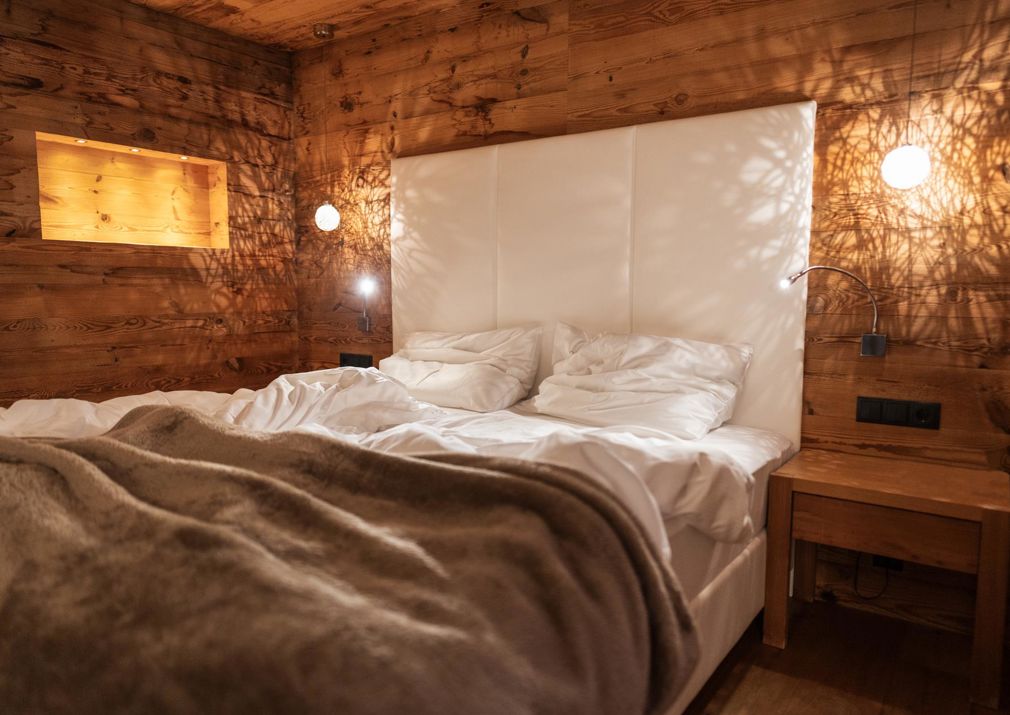 An unmade double bed