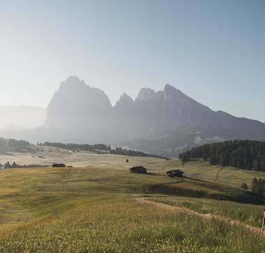 Hiking on Alpe di Siusi Seiser Alm with views of the breathtaking Dolomites