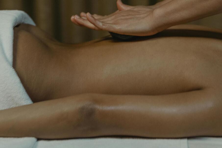 Relaxing back massage at the spa of Hotel Floralpina for a rejuvenating wellness holiday