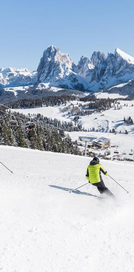 Skifahren auf der Seiser Alm in unserem Hotel direkt an der Piste